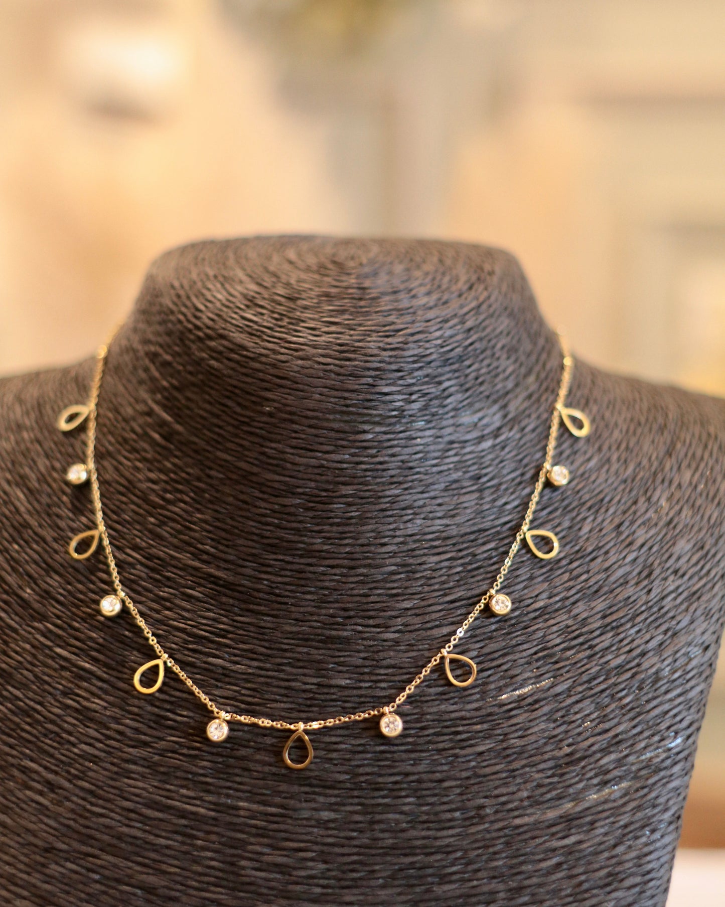 Elegant Gold Choker with Gemstone & Charm Accents