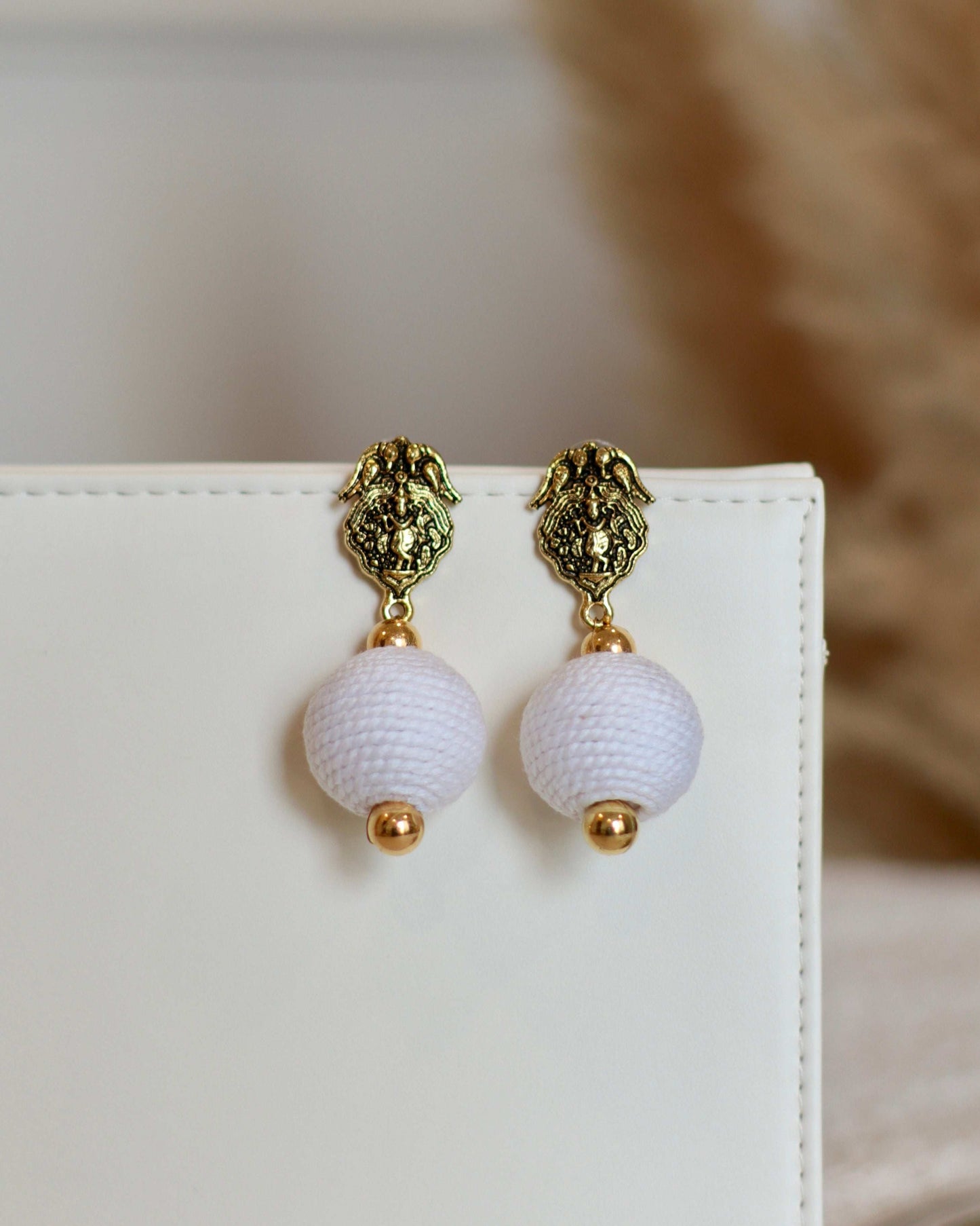 Stylish Thread Ball Drop Earrings with Charm - Occean By Soumali