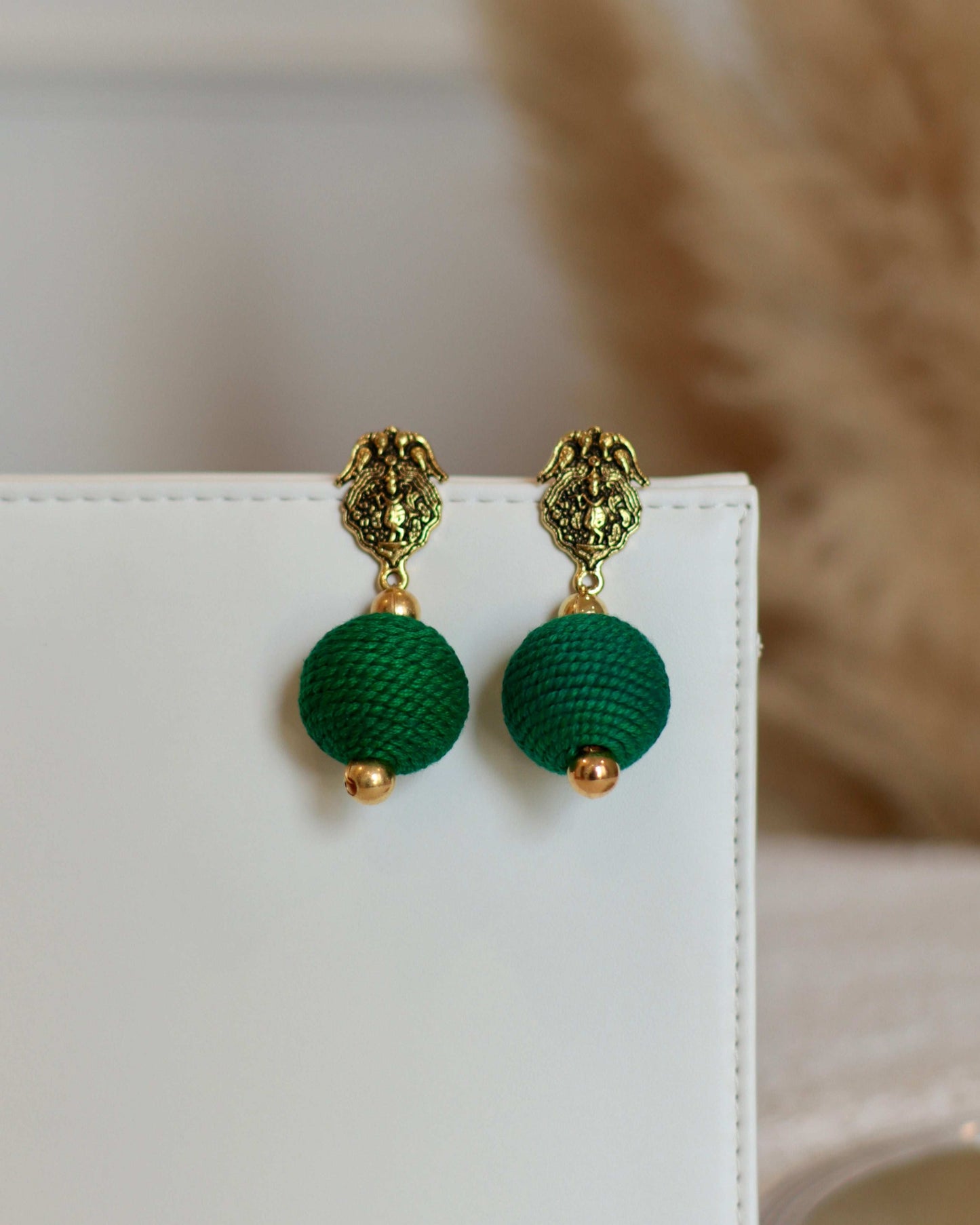 Stylish Thread Ball Drop Earrings with Charm - Occean By Soumali